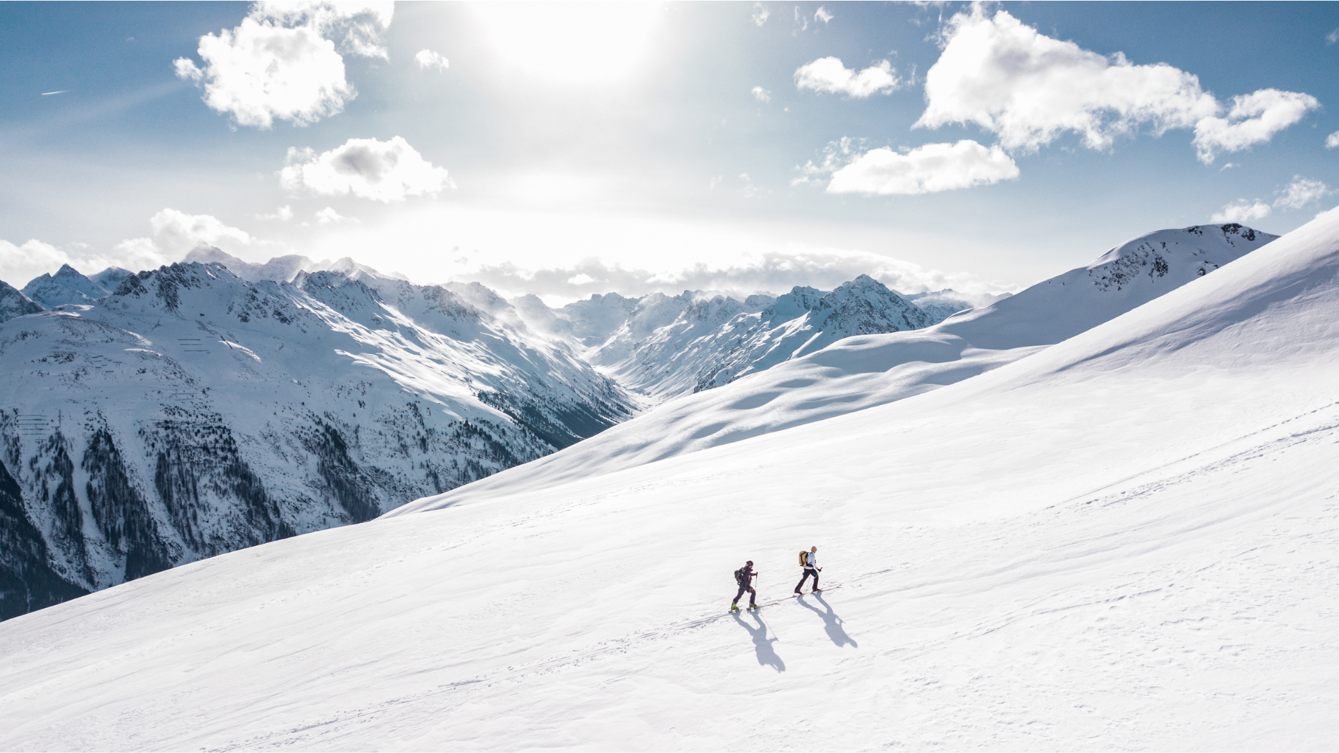 Skiers making the climb